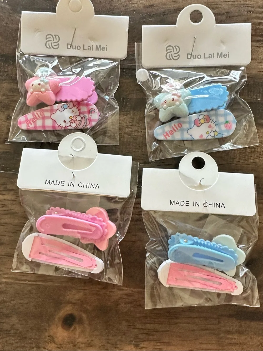 NWT Set of 4 Hello Kitty Child Size Hair Clips Barretts Pink & Blue